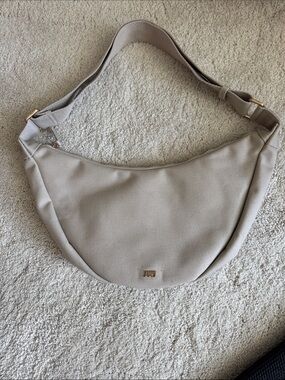 JuJu Taupe Crescent Shoulder Bag with Gold Hardware